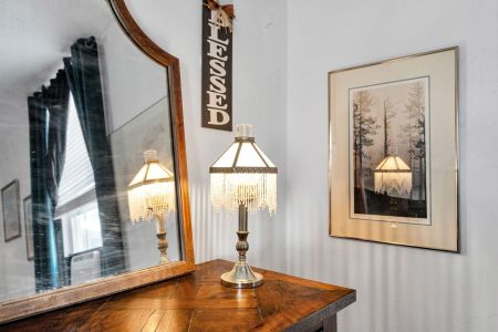 Soft lighting & charming historic accents set a relaxing mood.
